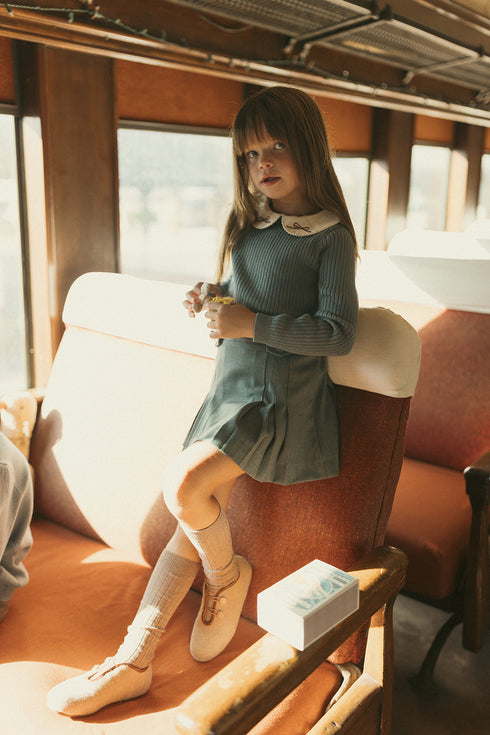 1984 Ribbed Knit Sweater with Plaid Skirt